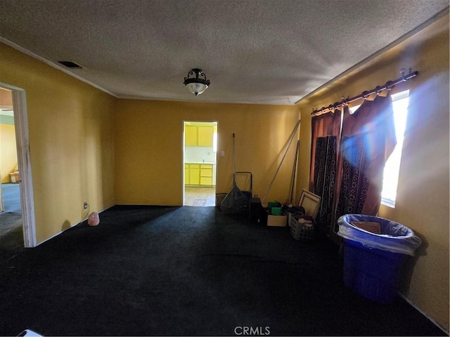 5738 S Mullen Ave, Los Angeles, CA 90043 - empty room featuring a textured ceiling