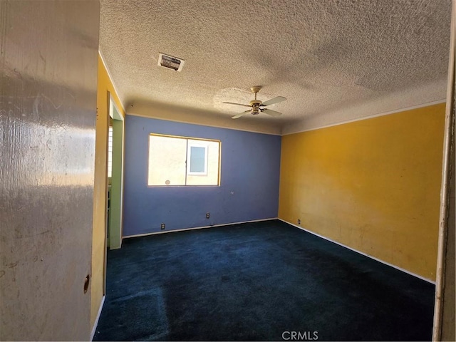 5738 S Mullen Ave, Los Angeles, CA 90043 - spare room featuring ceiling fan, dark carpet, a textured ceiling, and baseboards