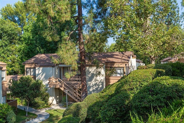 22890 Hilton Head Dr Unit 294, Diamond Bar, CA 91765 - view of side of property featuring stairs and stucco siding