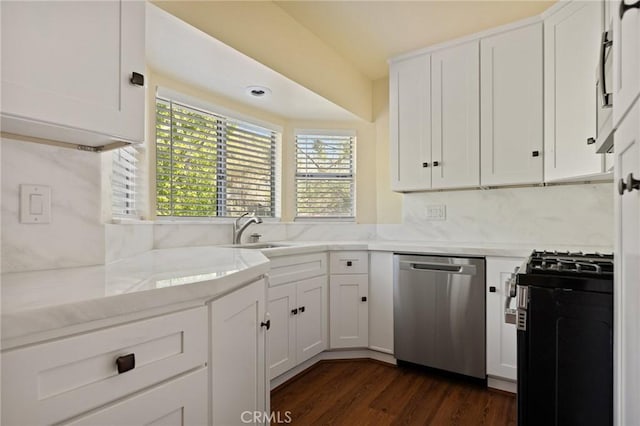 32296 Fern Dr, Running Springs, CA 92382 - kitchen with appliances with stainless steel finishes, a sink, healthy amount of natural light, and white cabinetry