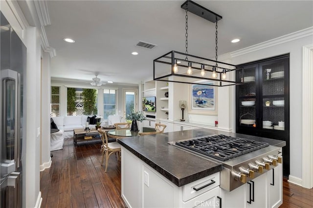 93 Old Course Dr, Newport Beach, CA 92660 - kitchen featuring stainless steel gas cooktop, ceiling fan, dark wood-type flooring, dark countertops, and open floor plan