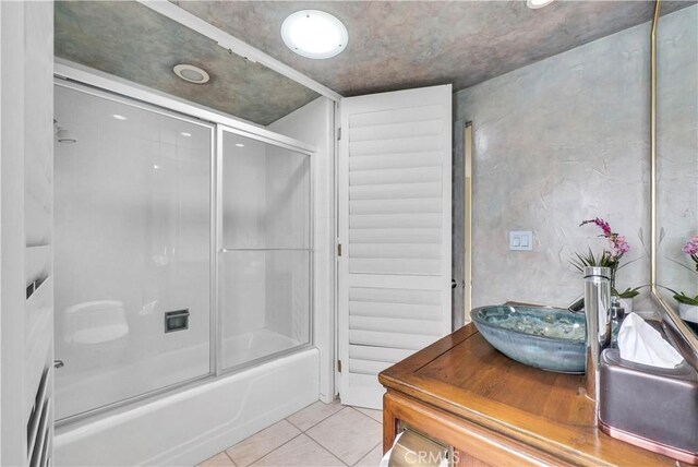 537 Dunnegan Pl, Laguna Beach, CA 92651 - full bathroom with tile patterned flooring, shower / bath combination with glass door, and vanity