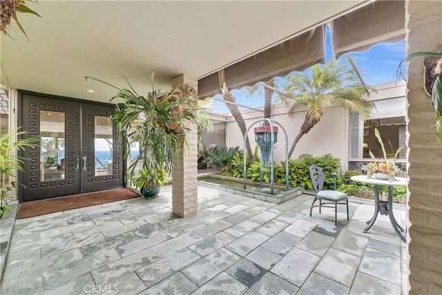 537 Dunnegan Pl, Laguna Beach, CA 92651 - view of patio / terrace with french doors