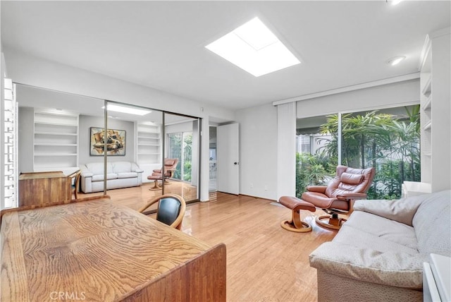 537 Dunnegan Pl, Laguna Beach, CA 92651 - living room featuring light wood-type flooring and built in features