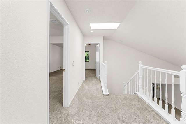 1234 Via Palermo, Redlands, CA 92374 - corridor with an upstairs landing, carpet, a skylight, and lofted ceiling