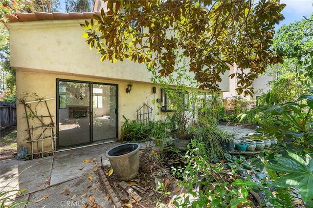 1234 Via Palermo, Redlands, CA 92374 - rear view of house with stucco siding and a patio area