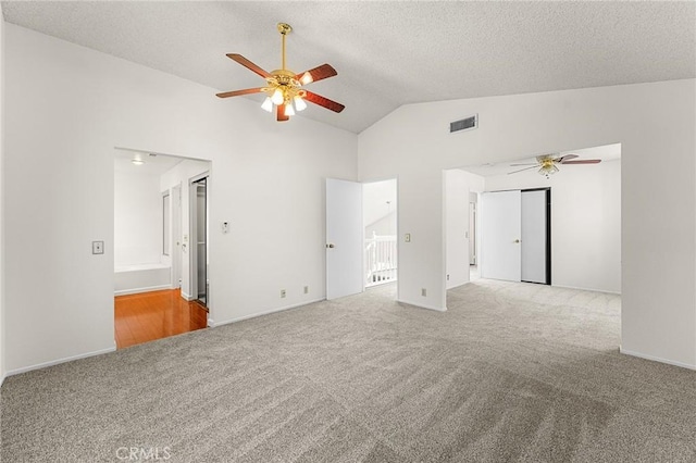 1234 Via Palermo, Redlands, CA 92374 - unfurnished room featuring carpet floors, a ceiling fan, a textured ceiling, and high vaulted ceiling