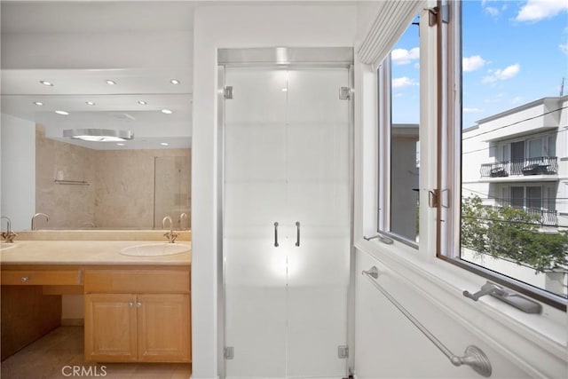 132 S Crescent Dr Unit 202, Beverly Hills, CA 90212 - full bathroom featuring a shower stall, double vanity, and tile patterned floors
