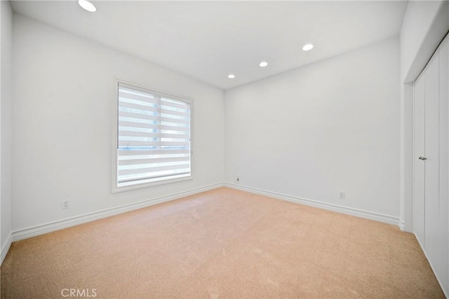 132 S Crescent Dr Unit 202, Beverly Hills, CA 90212 - unfurnished bedroom featuring light carpet, recessed lighting, baseboards, and a closet