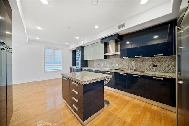 132 S Crescent Dr Unit 202, Beverly Hills, CA 90212 - kitchen with modern cabinets, a sink, white appliances, decorative backsplash, and baseboards