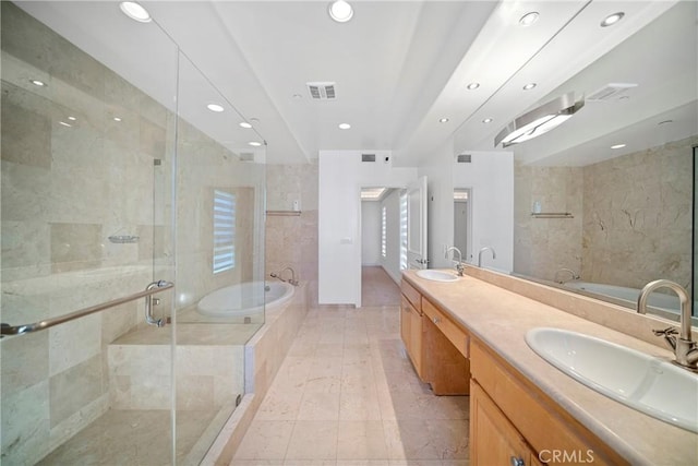 132 S Crescent Dr Unit 202, Beverly Hills, CA 90212 - full bath featuring a bath, double vanity, recessed lighting, a stall shower, and tile patterned floors