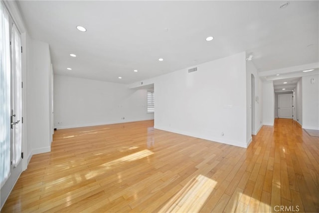 132 S Crescent Dr Unit 202, Beverly Hills, CA 90212 - empty room featuring recessed lighting, light wood-type flooring, and baseboards