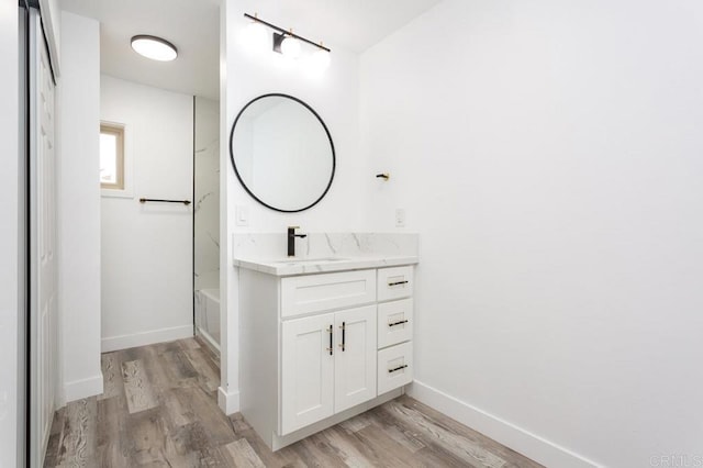 12049 Coping Pl, Lakeside, CA 92040 - full bathroom featuring wood finished floors, vanity, and baseboards