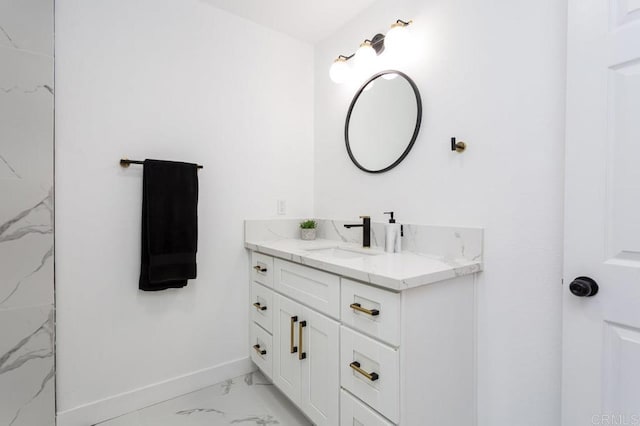 12049 Coping Pl, Lakeside, CA 92040 - bathroom featuring marble look tile flooring, vanity, and baseboards