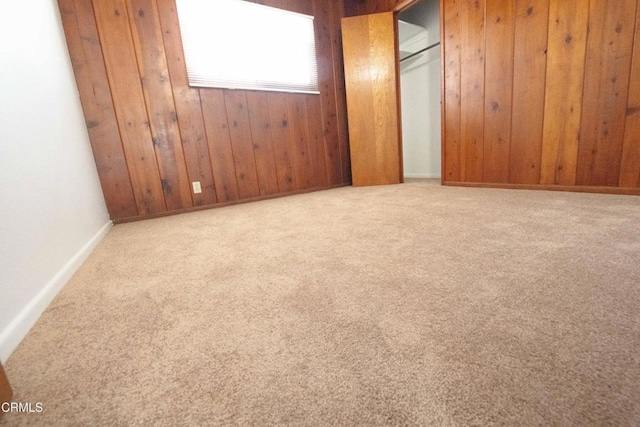 2256 Pierpont Blvd, Ventura, CA 93001 - empty room with wooden walls, carpet flooring, and baseboards