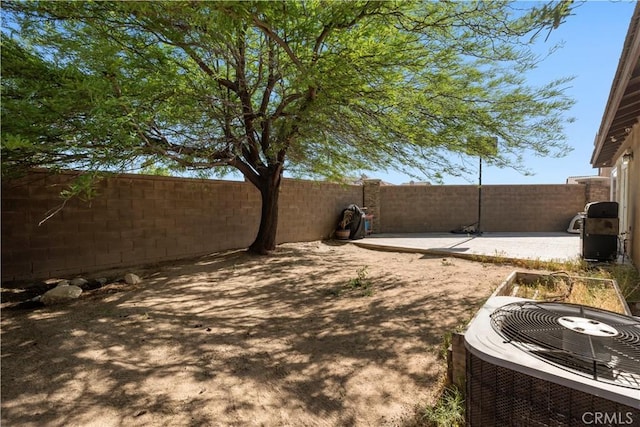 13009 Cerritos Ct, Hesperia, CA 92344 - fenced backyard featuring a patio area and central AC