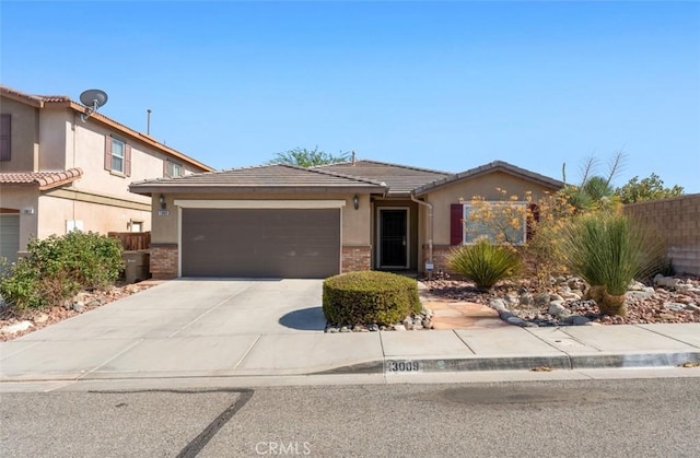 13009 Cerritos Ct, Hesperia, CA 92344 - view of front of property with stucco siding, a tile roof, concrete driveway, and an attached garage
