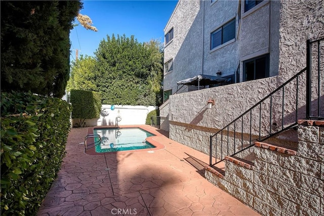5325 Lindley Ave Unit 202, Tarzana, CA 91356 - fenced backyard with stairs and a patio area