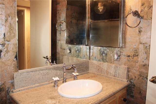 5325 Lindley Ave Unit 202, Tarzana, CA 91356 - bathroom with vanity and decorative backsplash