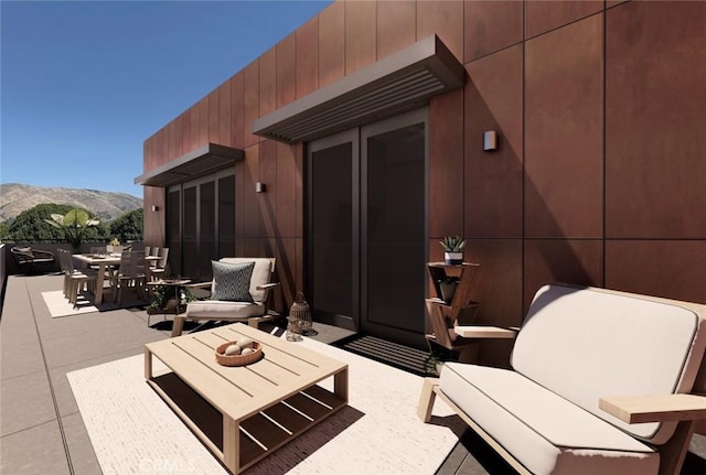 581 Higuera St Unit 208, San Luis Obispo, CA 93401 - view of patio / terrace with outdoor dining area, a mountain view, and outdoor lounge area