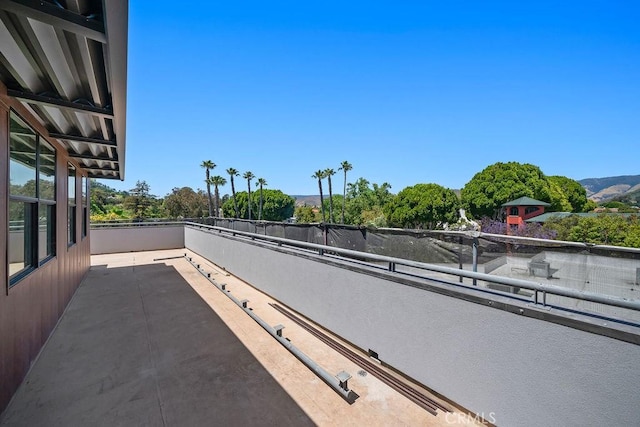 581 Higuera St Unit 208, San Luis Obispo, CA 93401 - view of patio with a balcony and a mountain view