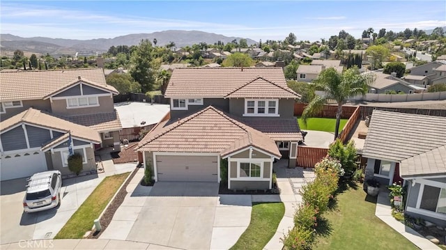 8798 Crest View Dr, Corona, CA 92883 - view of front of home with a tile roof, concrete driveway, a residential view, and an attached garage