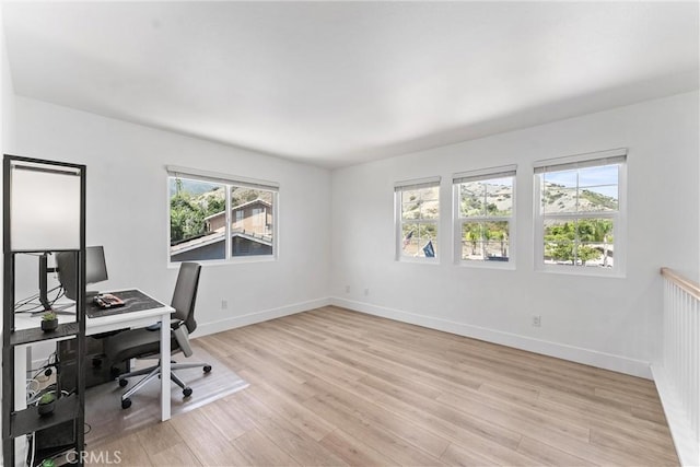 8798 Crest View Dr, Corona, CA 92883 - home office featuring light wood-style flooring and baseboards