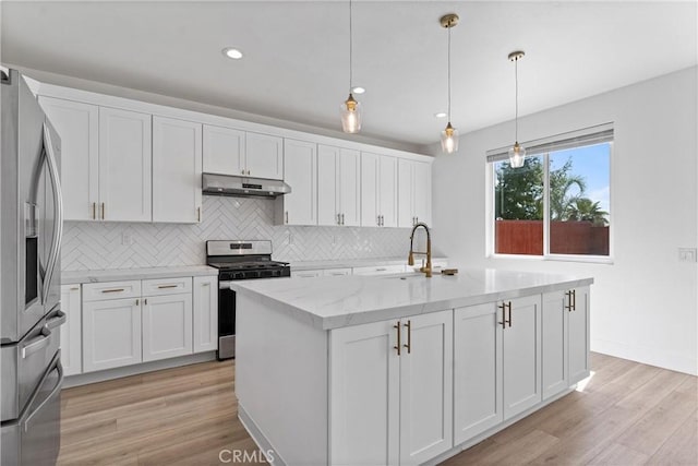 8798 Crest View Dr, Corona, CA 92883 - kitchen with appliances with stainless steel finishes, under cabinet range hood, backsplash, white cabinets, and recessed lighting