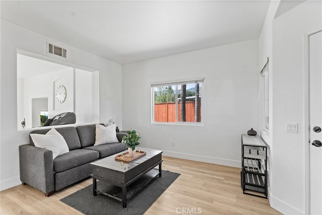 8798 Crest View Dr, Corona, CA 92883 - living room featuring light wood finished floors and baseboards