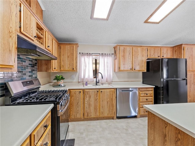 8307 Arrowhead Lake Rd, Hesperia, CA 92345 - kitchen with appliances with stainless steel finishes, a sink, light countertops, a textured ceiling, and light flooring