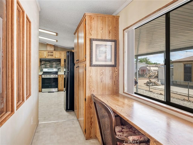 8307 Arrowhead Lake Rd, Hesperia, CA 92345 - corridor with a textured ceiling and vaulted ceiling