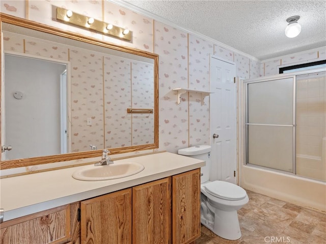 8307 Arrowhead Lake Rd, Hesperia, CA 92345 - bathroom with crown molding, a textured ceiling, vanity, toilet, and enclosed tub / shower combo