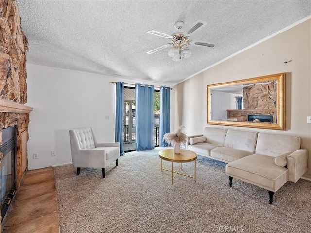 8307 Arrowhead Lake Rd, Hesperia, CA 92345 - living area featuring a glass covered fireplace, a textured ceiling, ceiling fan, vaulted ceiling, and ornamental molding