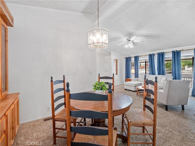 8307 Arrowhead Lake Rd, Hesperia, CA 92345 - dining space with a textured ceiling, light colored carpet, a chandelier, and a ceiling fan