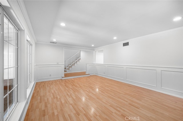 1683 Camberwell Pl, Westlake Village, CA 91361 - spare room featuring crown molding, a decorative wall, recessed lighting, light wood finished floors, and a wainscoted wall