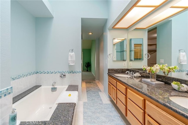1049 Fairview Ave Unit 5, Arcadia, CA 91007 - bathroom with double vanity, a bath, and tile patterned flooring