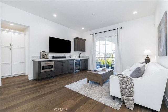 4029 Bernardo Dr, San Luis Obispo, CA 93401 - living room featuring beverage cooler, dark wood-style flooring, wet bar, and recessed lighting