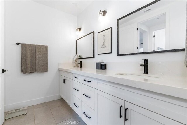 4029 Bernardo Dr, San Luis Obispo, CA 93401 - full bathroom with double vanity, baseboards, and tile patterned floors