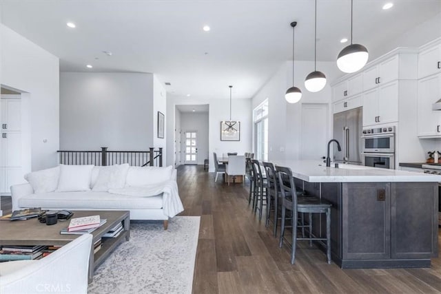 4029 Bernardo Dr, San Luis Obispo, CA 93401 - living area featuring dark wood-style flooring and recessed lighting