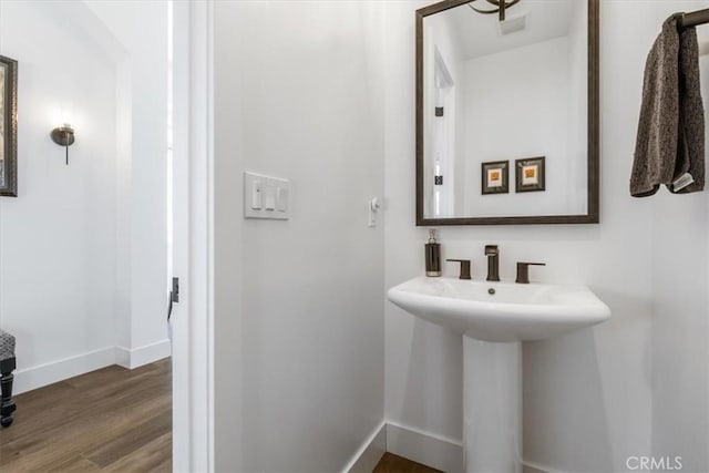4029 Bernardo Dr, San Luis Obispo, CA 93401 - bathroom with baseboards and wood finished floors