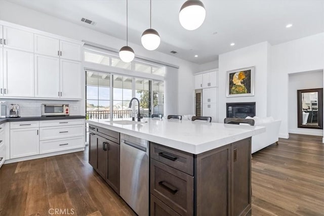 4029 Bernardo Dr, San Luis Obispo, CA 93401 - kitchen with a sink, dishwasher, white cabinets, dark wood finished floors, and recessed lighting