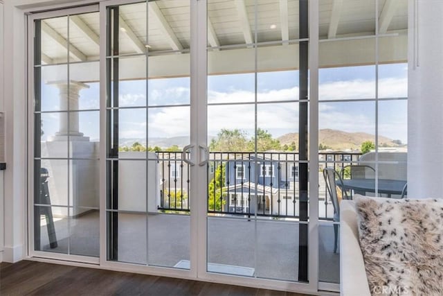 4029 Bernardo Dr, San Luis Obispo, CA 93401 - entryway featuring a mountain view, dark wood-type flooring, and a wall of windows