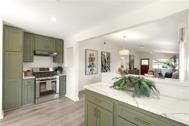 14911 Van Buren Ave, Gardena, CA 90247 - kitchen featuring green cabinetry, gas stove, under cabinet range hood, light wood-style floors, and decorative light fixtures