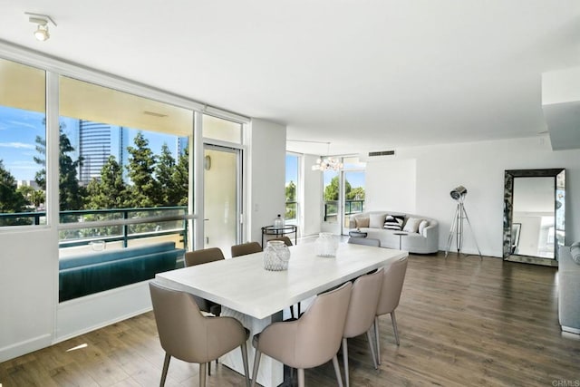 510 First Ave Unit 402, San Diego, CA 92101 - dining room with a chandelier and wood finished floors