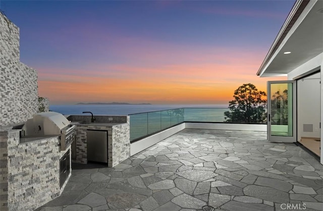 31 N Vista De Catalina, Laguna Beach, CA 92651 - patio terrace at dusk featuring a patio and a water view