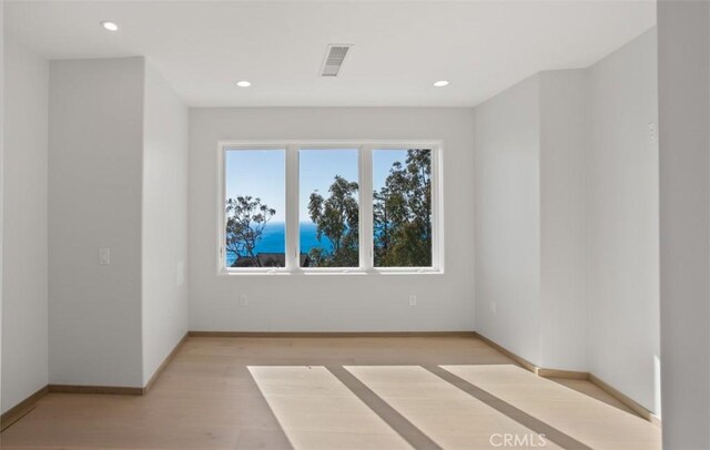 31 N Vista De Catalina, Laguna Beach, CA 92651 - empty room featuring light wood-type flooring, recessed lighting, and baseboards