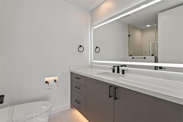 31 N Vista De Catalina, Laguna Beach, CA 92651 - bathroom with vanity, toilet, and baseboards