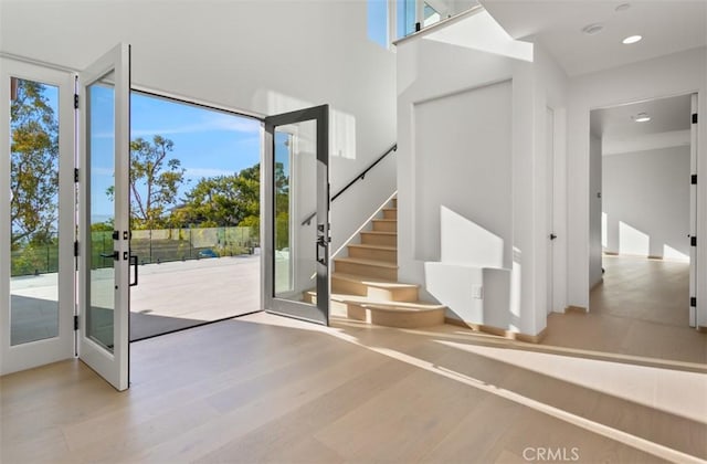 31 N Vista De Catalina, Laguna Beach, CA 92651 - entryway with wood finished floors, stairs, french doors, and recessed lighting