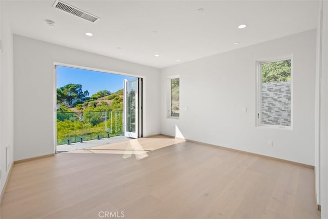 31 N Vista De Catalina, Laguna Beach, CA 92651 - spare room with wood finished floors, recessed lighting, and baseboards