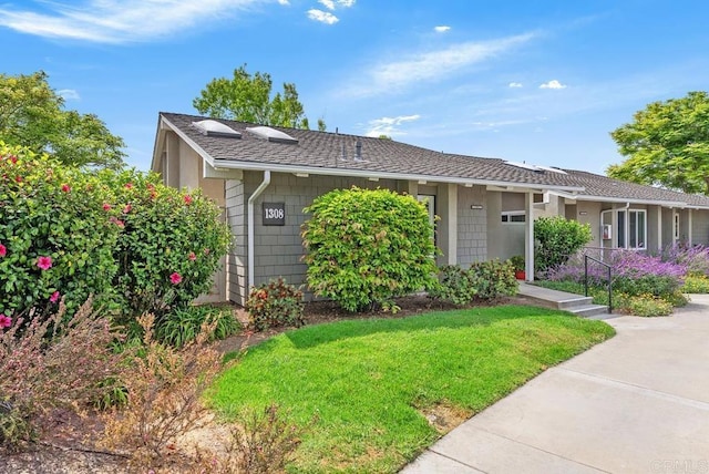 8933 Yolo Cir Unit 1308-A, Huntington Beach, CA 92646 - ranch-style home with a front lawn